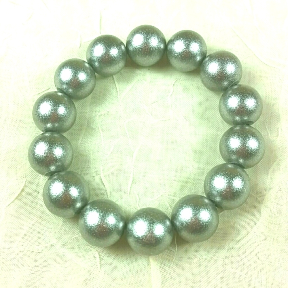 Big gray metallic balls bracelets on stretch